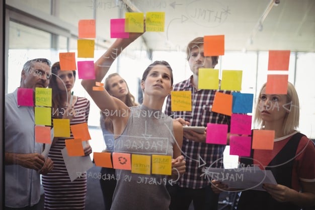 Event Strategists Collaborating on a Whiteboard